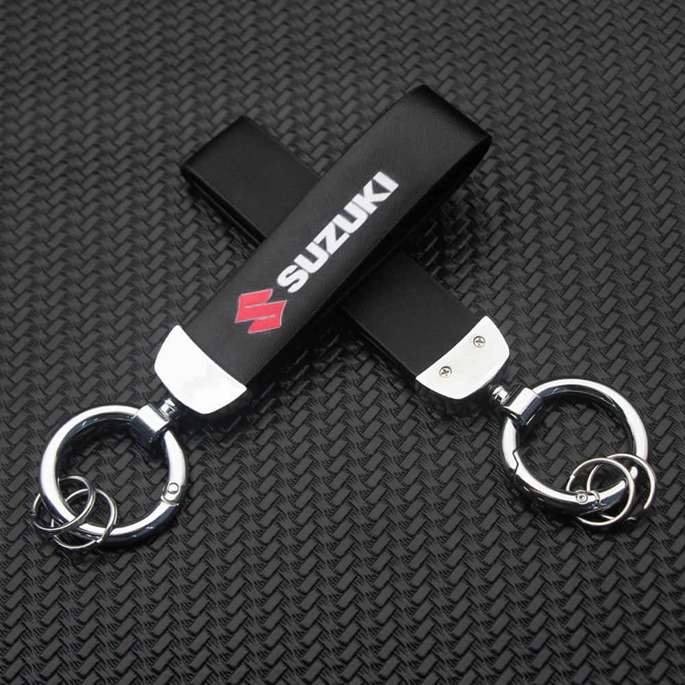 3D Kovu, Kože Znak Auto Keychain prívesok na Kľúč Krúžkami Pre Suzuki Swift SX4 Grand Vitara Liana Aerio Jimny Samuraj Amagatarai